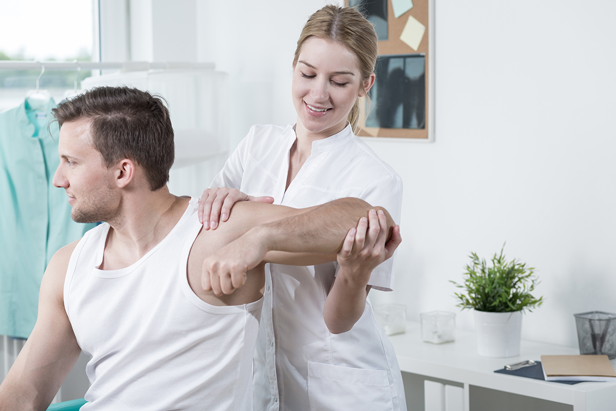 A man receiving physio therapy.